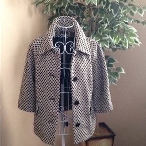 Black and white jacket with mid-arm sleeves